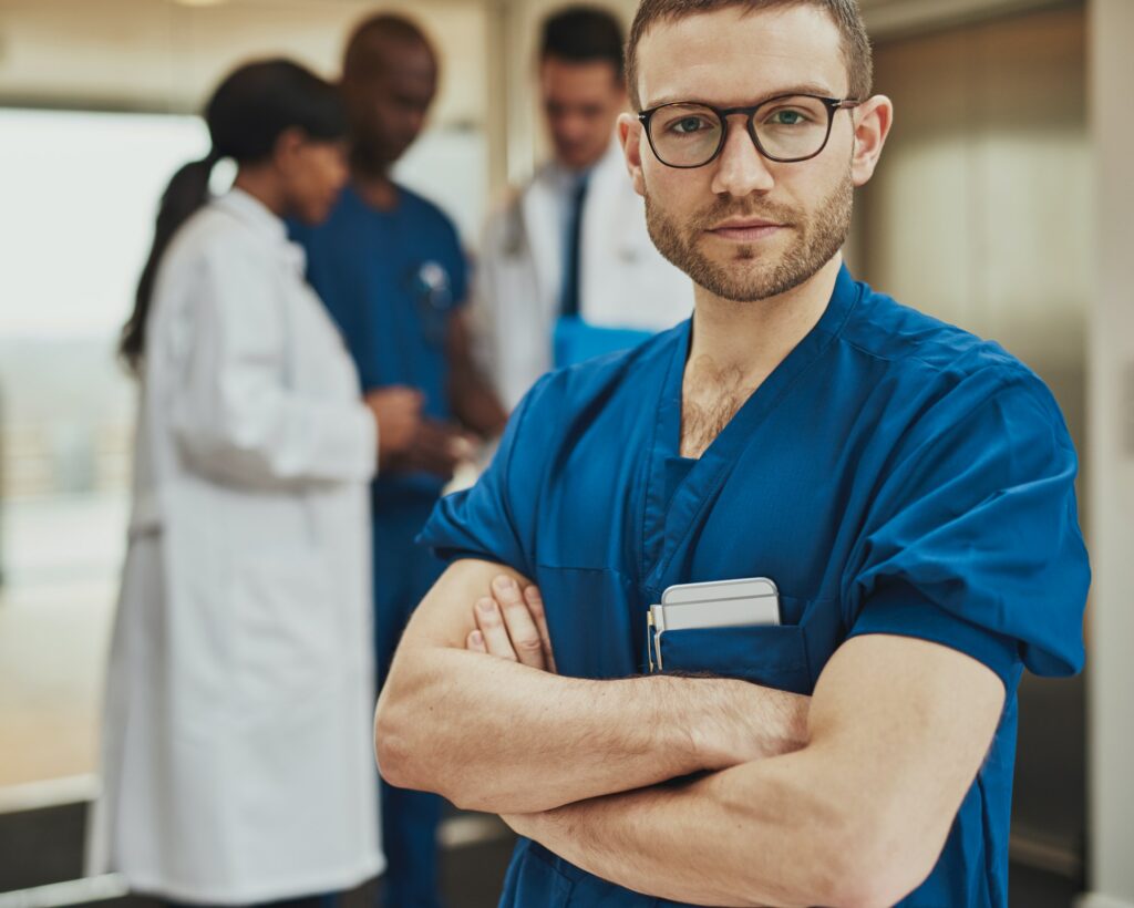 Serious surgeon in front of team